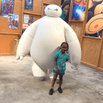 Girl with cerebral palsy with Baymax from Big Hero 6