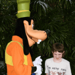 Colten meeting Goofy in Disney World