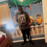 Jayden with autism in his room at Legoland