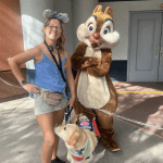 Olivia and her service dog meet Dale the chipmunk