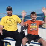 Teenage boy with epilepsy enjoying a boat ride in Florida