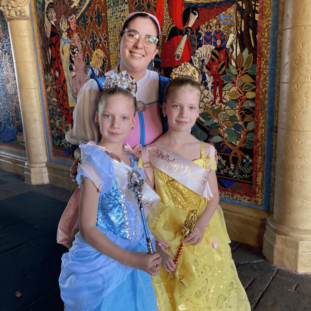 Girl with cerebral palsy dressed as a Disney Princess